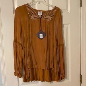 yellow top with cute embroidered details